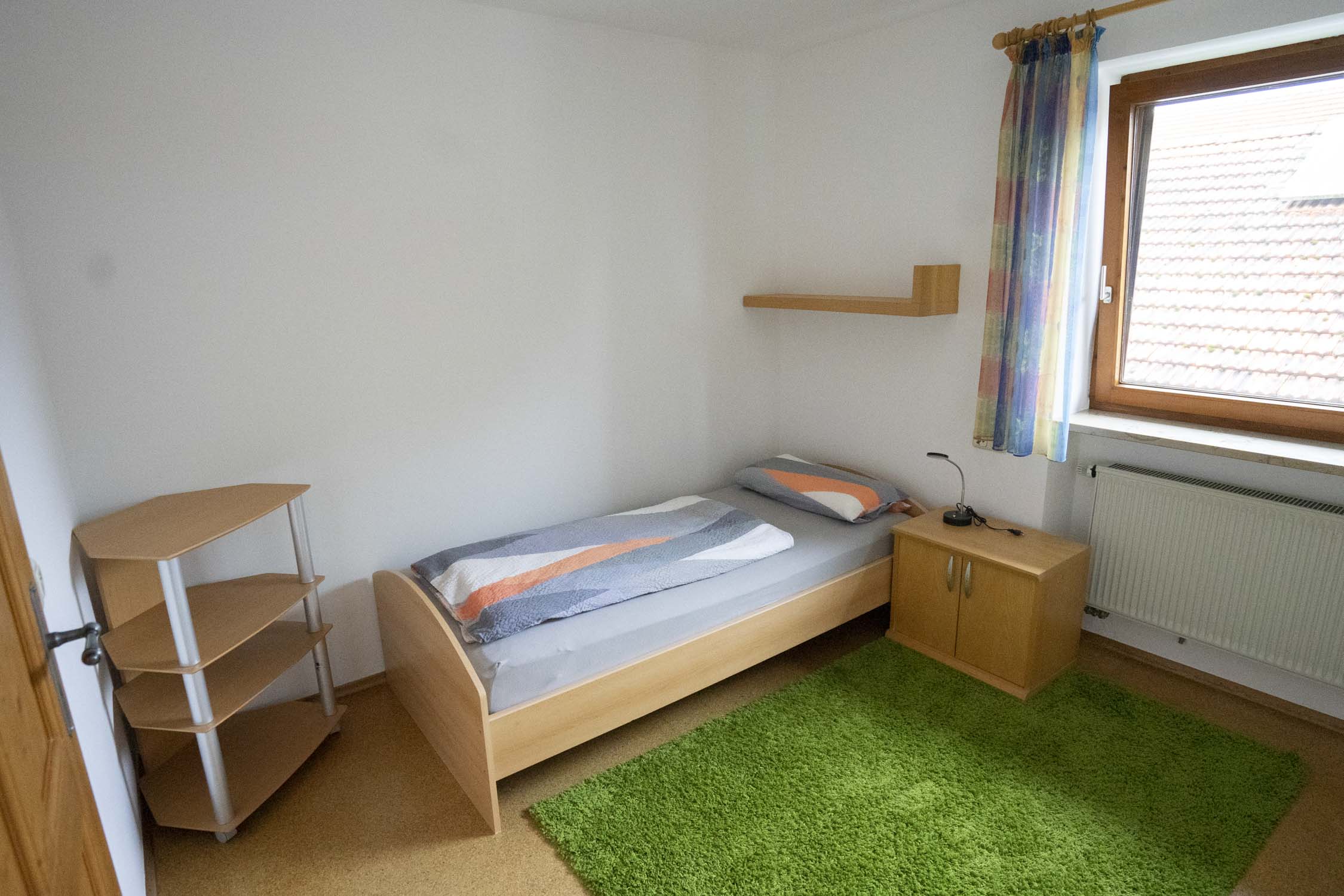 Schlafzimmer mit Einzelbett, Ferienwohnung, Westernach, Mindelheim, Allgäu